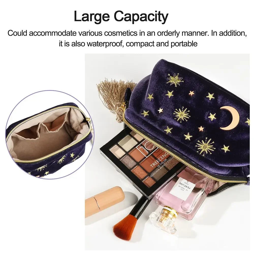 Luxury velvet embroidered cosmetic bag with stars and moon, large capacity, makeup items inside.
