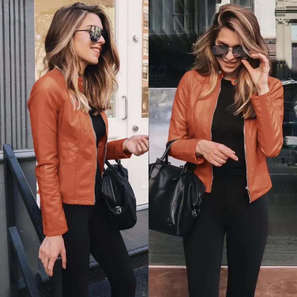 Woman wearing orange plus size leather jacket with black outfit and handbag outdoors