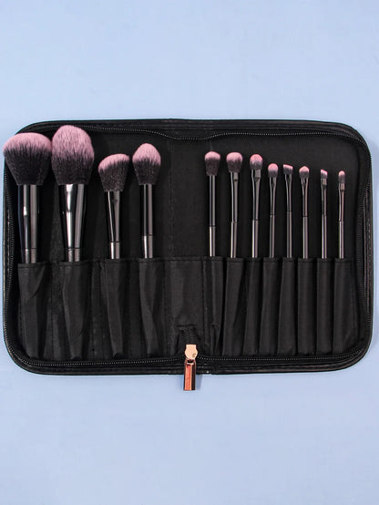 Luxury soft makeup brush set of 12 in black zippered case on light blue background