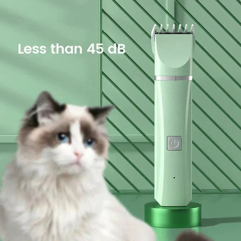 Pet grooming kit with quiet green clipper and a fluffy cat, less than 45 dB noise level