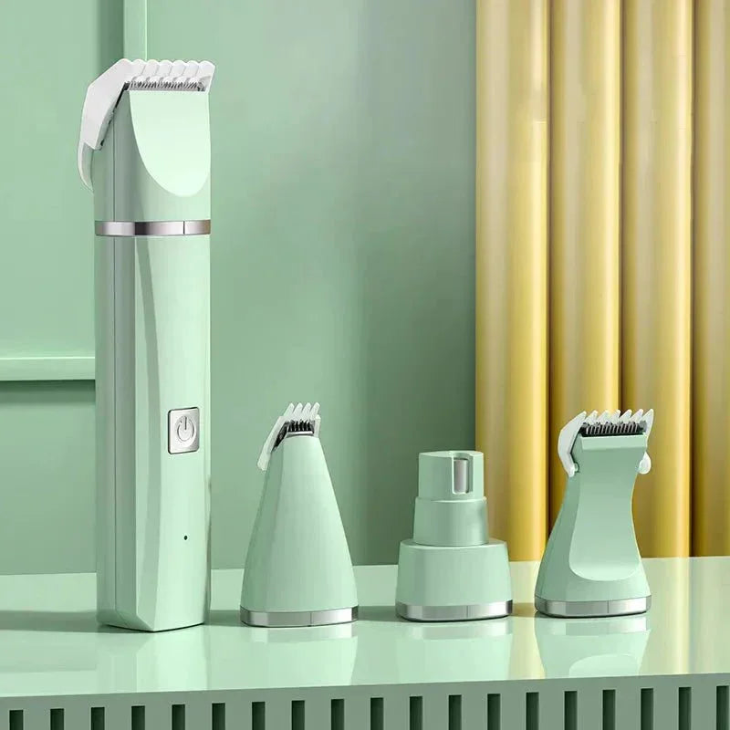 Mint green all-in-one pet grooming kit with four attachments on a matching surface.