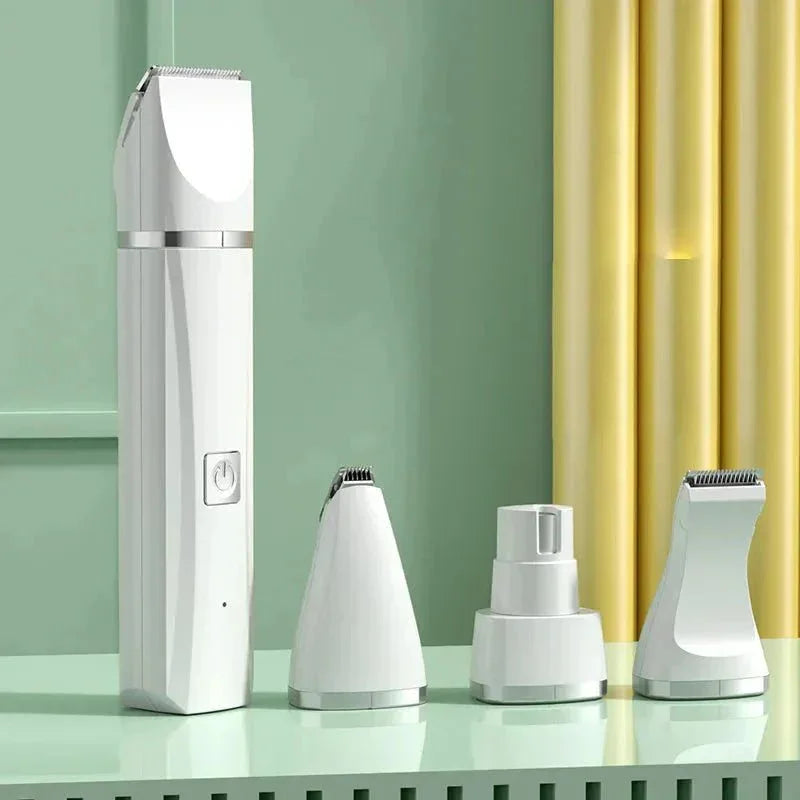 All-in-one pet grooming kit with white trimmer and three attachments on a mint green table