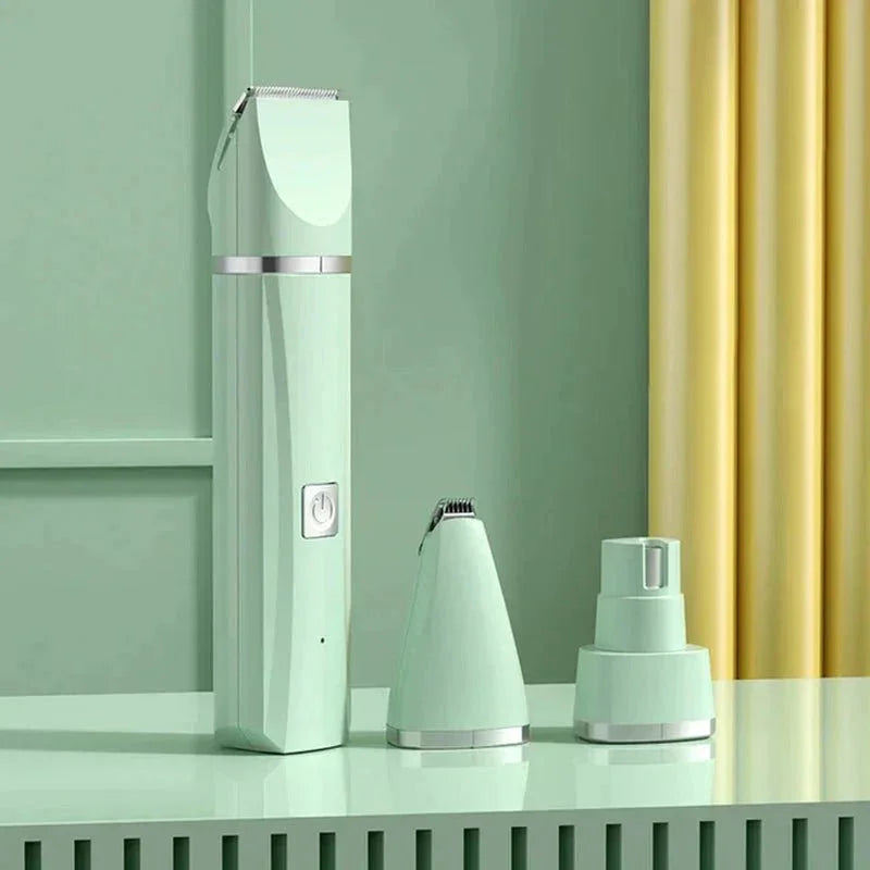 Mint green all-in-one pet grooming kit with three attachments on a matching surface