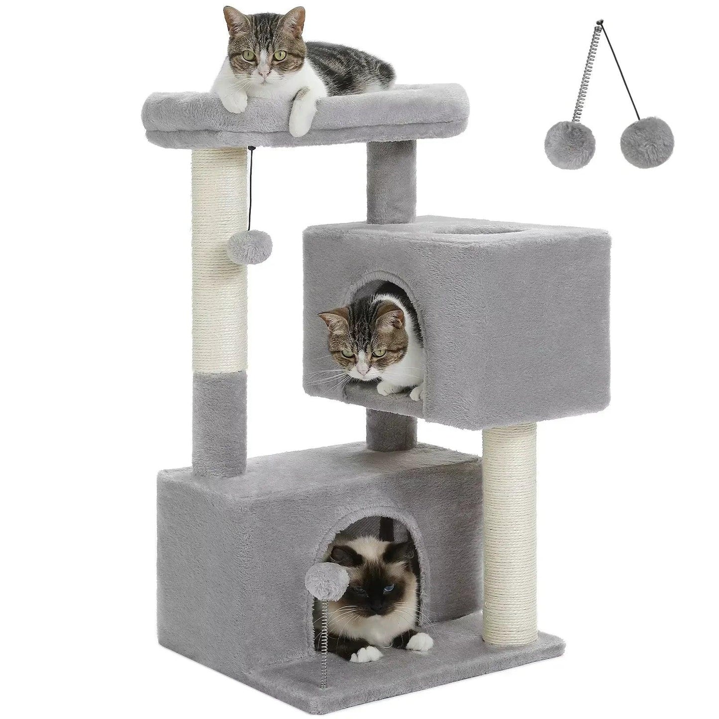 Three cats on a gray cat tree tower with scratching posts and hanging toys
