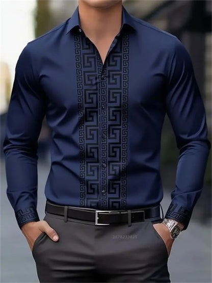 Men's navy blue long-sleeve button-up shirt with black geometric pattern, paired with gray pants and black belt