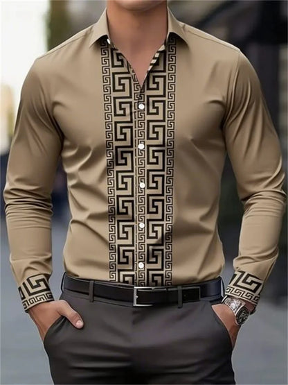 Men's beige long-sleeve button-up shirt with black geometric Greek key pattern on front and cuffs, styled with dark trousers