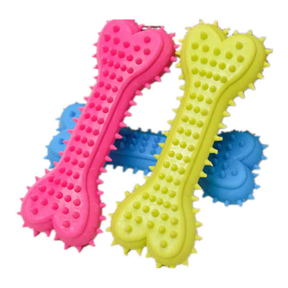 Three colorful rubber dog chew toys shaped like bones in pink, yellow, and blue with textured nubs for dental cleaning
