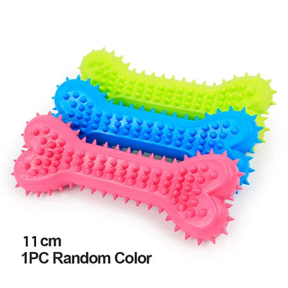 Set of three colorful rubber dog chew toys shaped like bones with textured spikes in pink, blue, and green