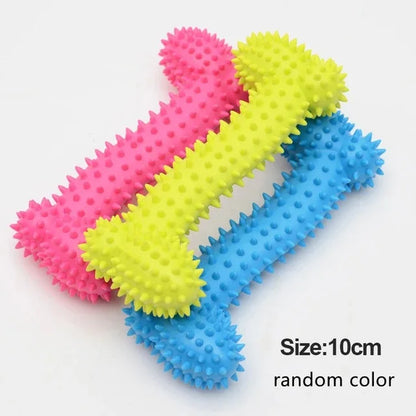 Three colorful rubber spiked dog chew toys in pink, yellow, and blue, 10cm size
