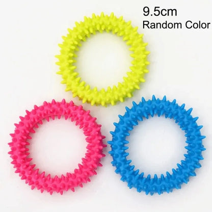 Three colorful spiked rubber chew toys for small dogs in yellow, pink, and blue, 9.5cm size