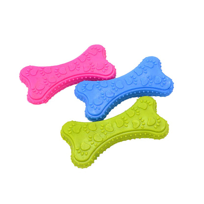 Set of three colorful rubber dog chew toys shaped like bones with paw print textures