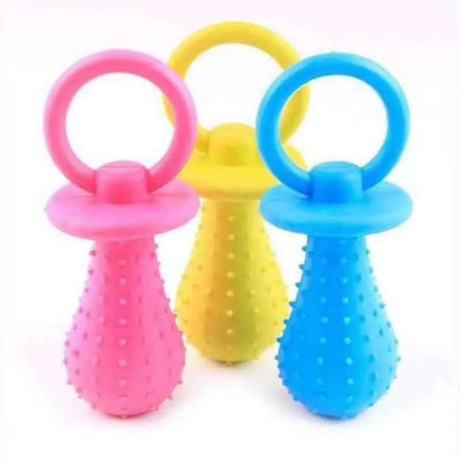 Colorful rubber chew toys for small dogs with textured surfaces in pink, yellow, and blue