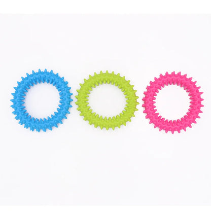 Set of three spiked rubber chew rings in blue, green, and pink for small dog teeth cleaning