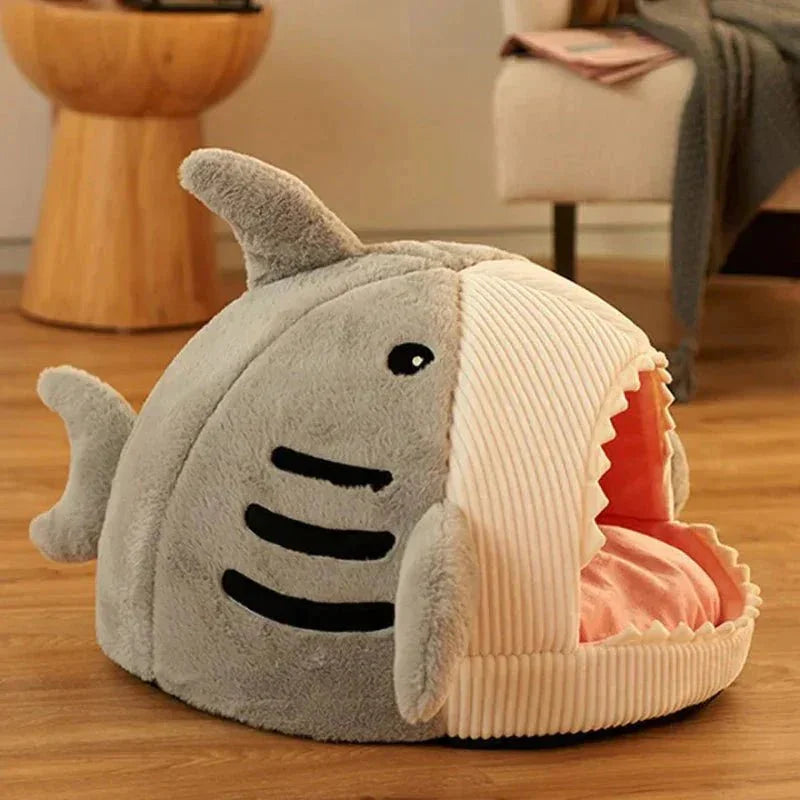 Shark mouth pet bed for cats and small dogs on wooden floor in cozy room