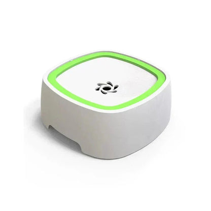 No splash dog water bowl with green trim and spill-proof lid on white background