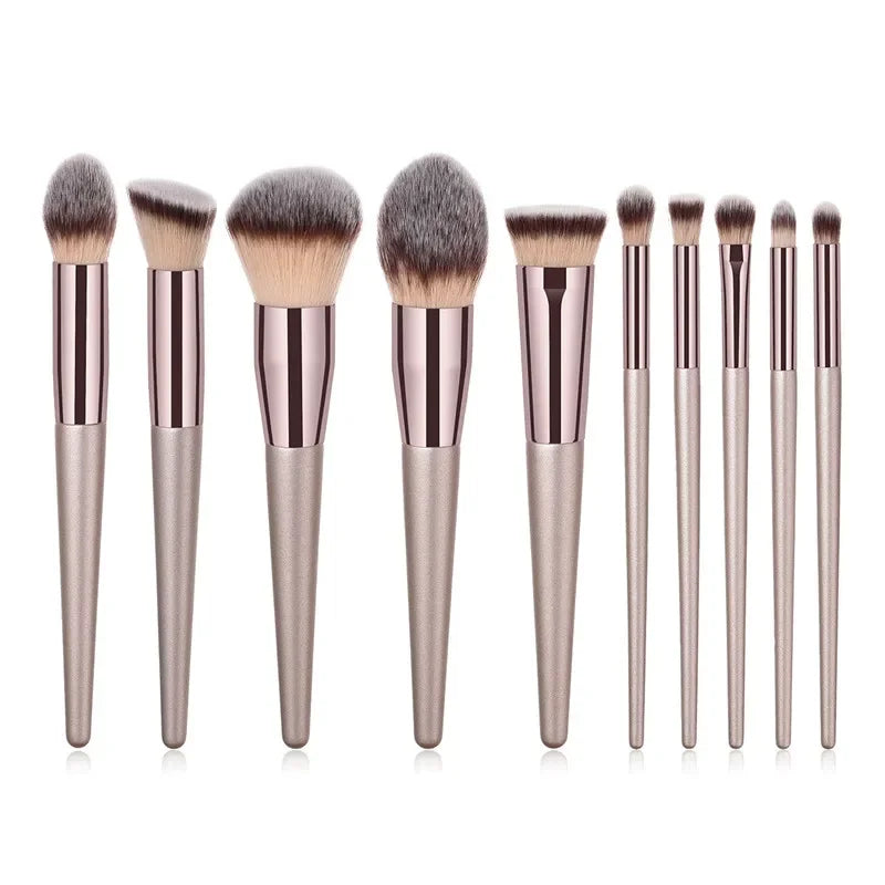 Champagne luxury makeup brush set with metallic handles and soft bristles, 10 brushes lined up