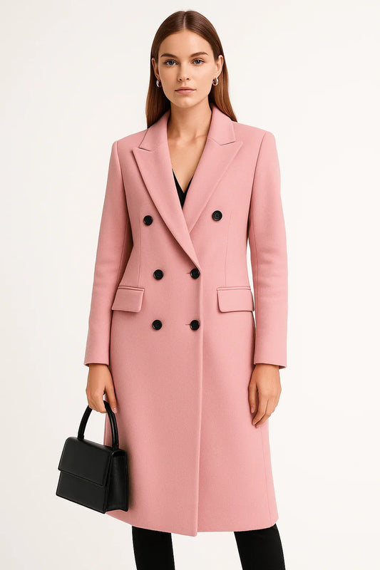 Woman wearing elegant pink wool trench coat with black buttons, holding black handbag
