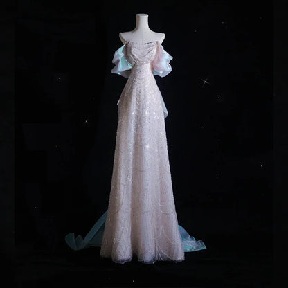 Luxury pearl and sequin evening gown with elegant bow detail, high-end formal dress for prom, parties, and special events