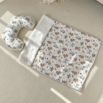 Luxury pet blanket and pillow set with cute animal pattern on beige carpet
