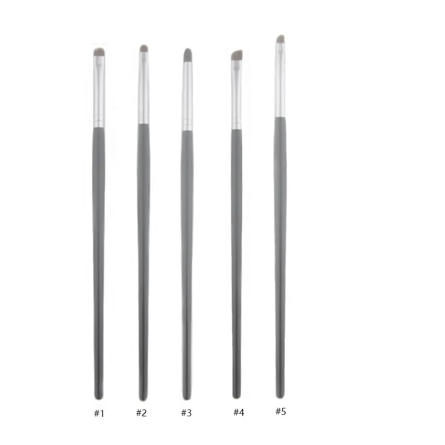 Five luxury pony hair eyeshadow brushes with black handles on a white background