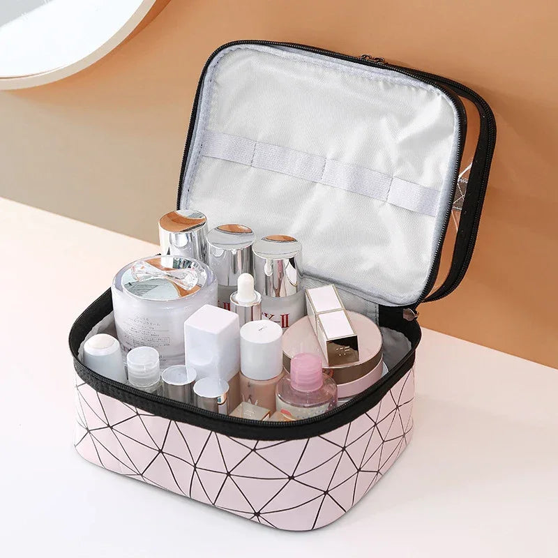 Luxury travel cosmetic organizer bag with skincare and makeup bottles on a vanity