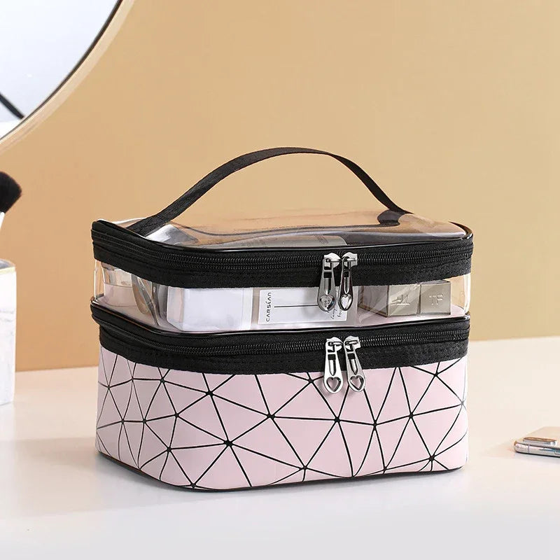 Luxury travel cosmetic organizer bag with geometric pink bottom and clear top compartment