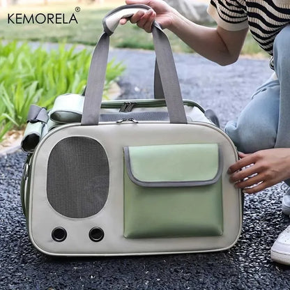 Portable green and beige pet travel carrier bag with mesh ventilation and front pocket being held outdoors