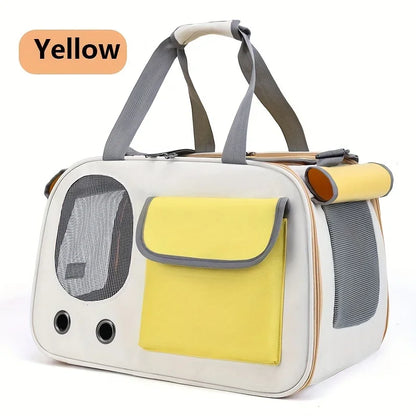 Portable yellow pet travel carrier bag with gray handles and mesh side windows