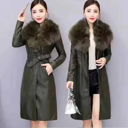 Women wearing long dark green PU leather coats with large faux fur collars, styled with earrings and accessories