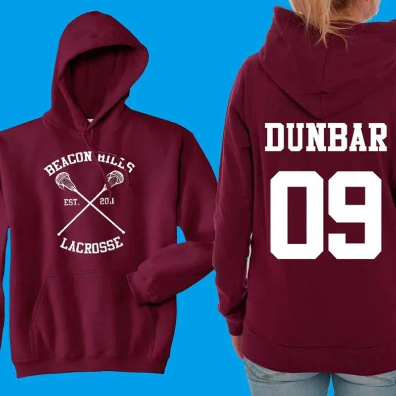 Maroon Beacon Hills Lacrosse hoodie with DUNBAR 09 on back, blue background
