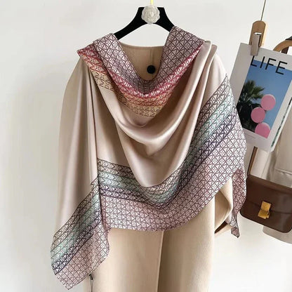 Beige geometric print silk scarf draped on a coat, elegant accessory for women