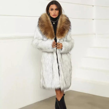 Woman wearing thick faux fox fur coat with large brown collar over black outfit and black boots indoors